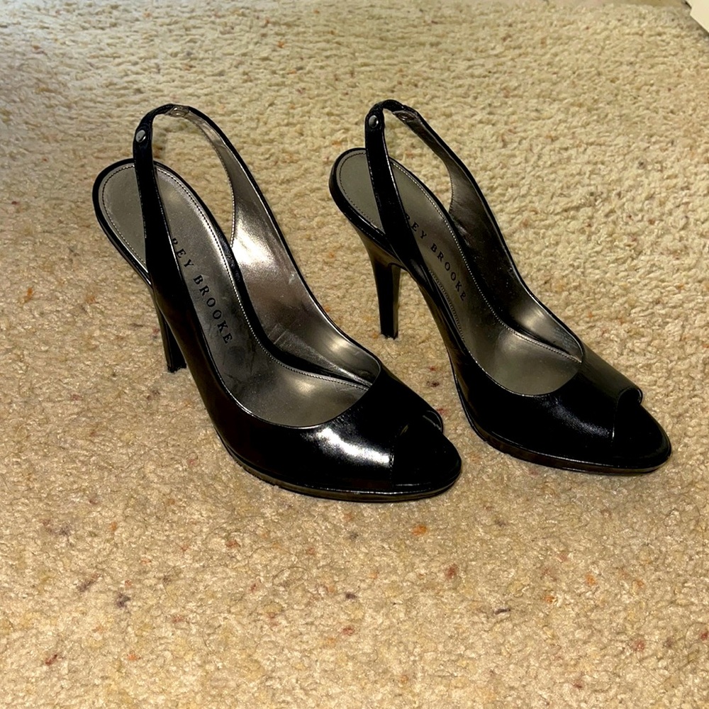 Audrey Brooke black heels very classy with strap for ankle. Perfect condition!